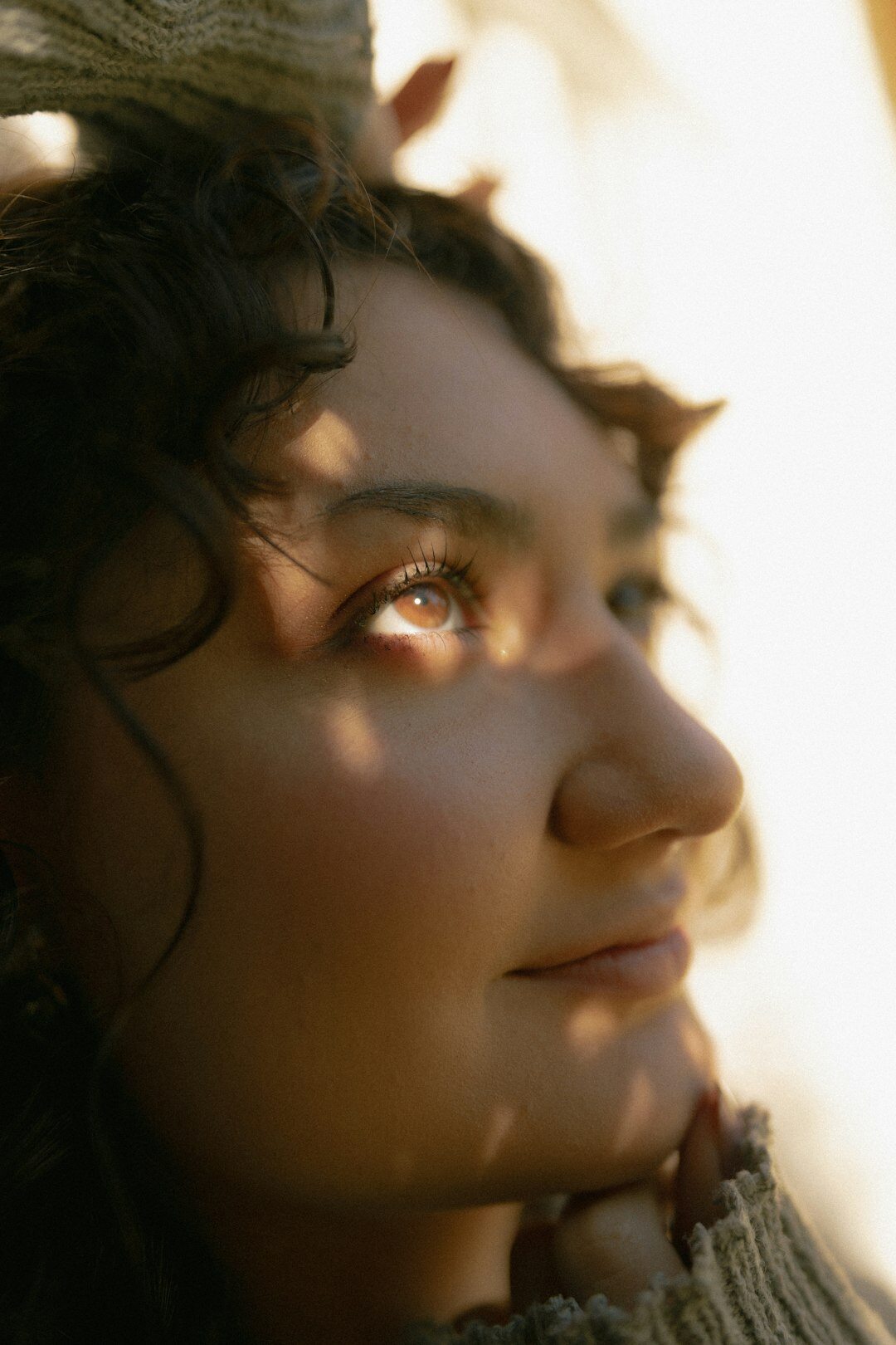 person thinking in shadow