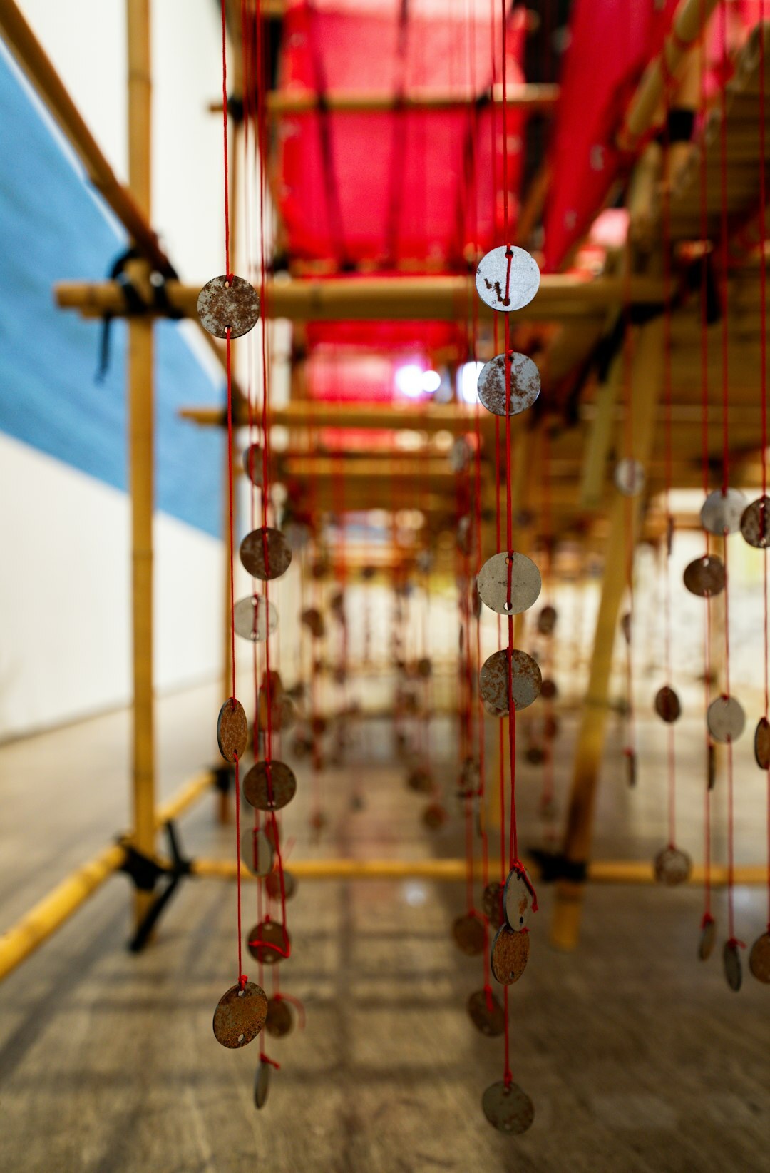 Detective evidence board with photos and red string connections